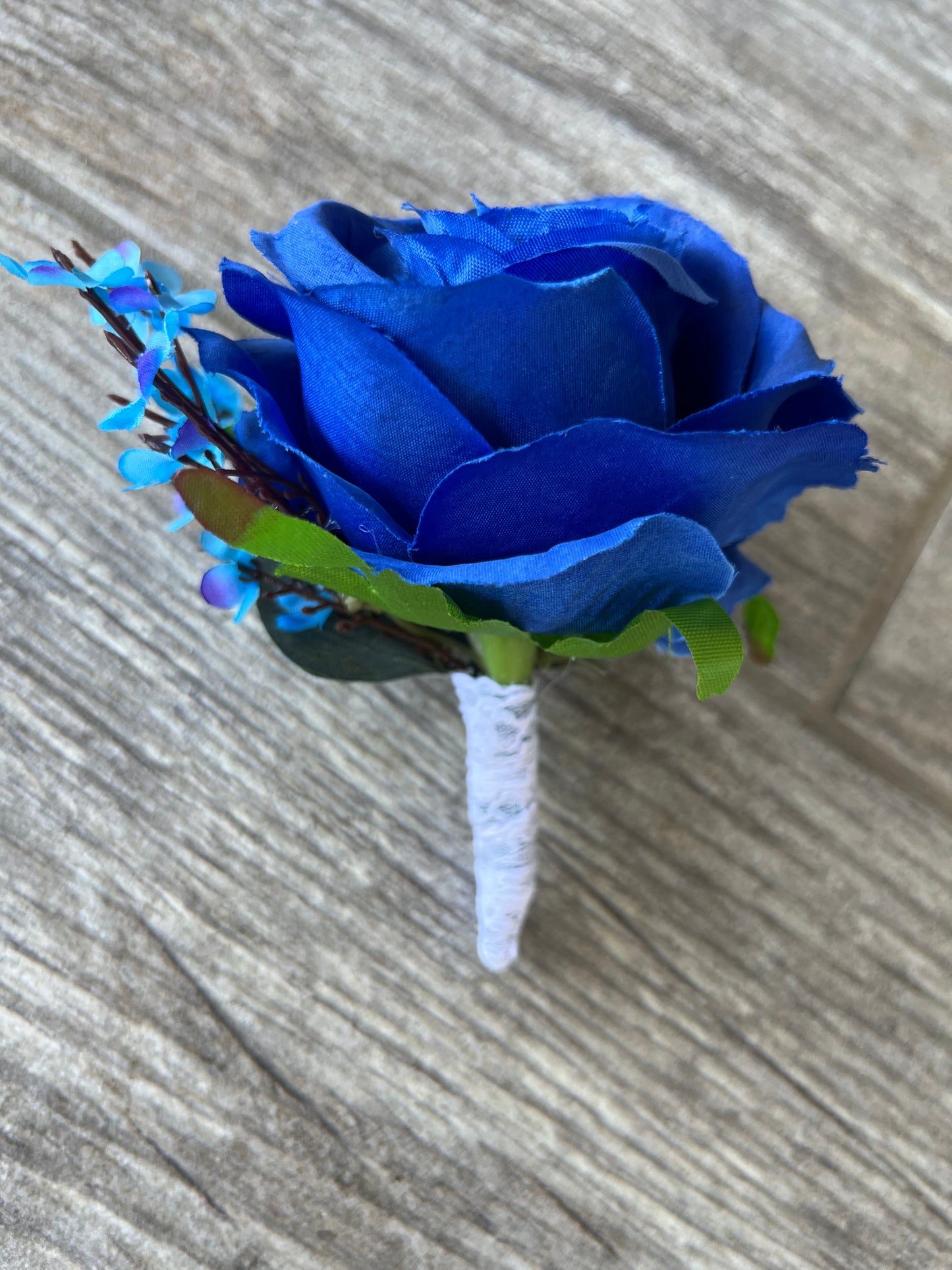 Royal Blue Rose & Turquoise Baby’s Breath Boutonniere