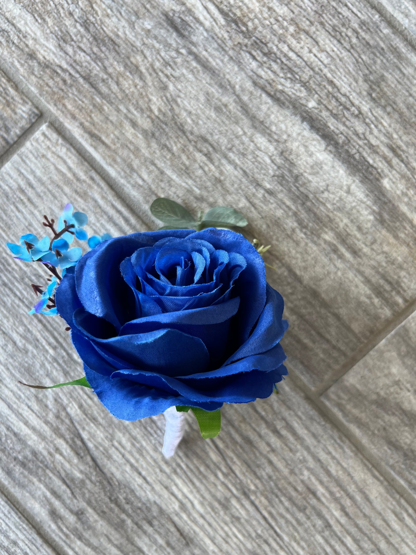 Royal Blue Rose & Turquoise Baby’s Breath Boutonniere